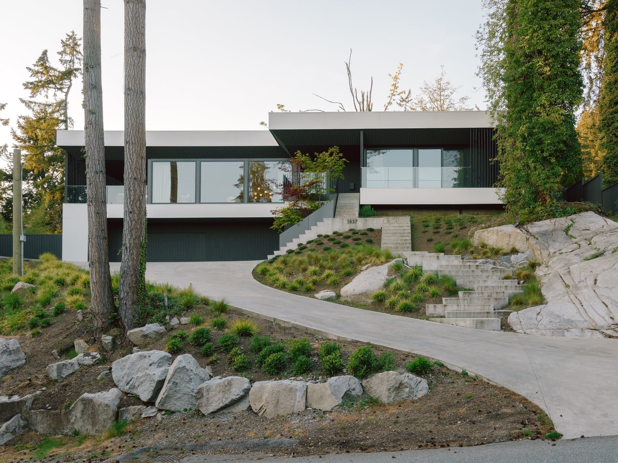 Bayridge — Street elevation above a sloping rock garden