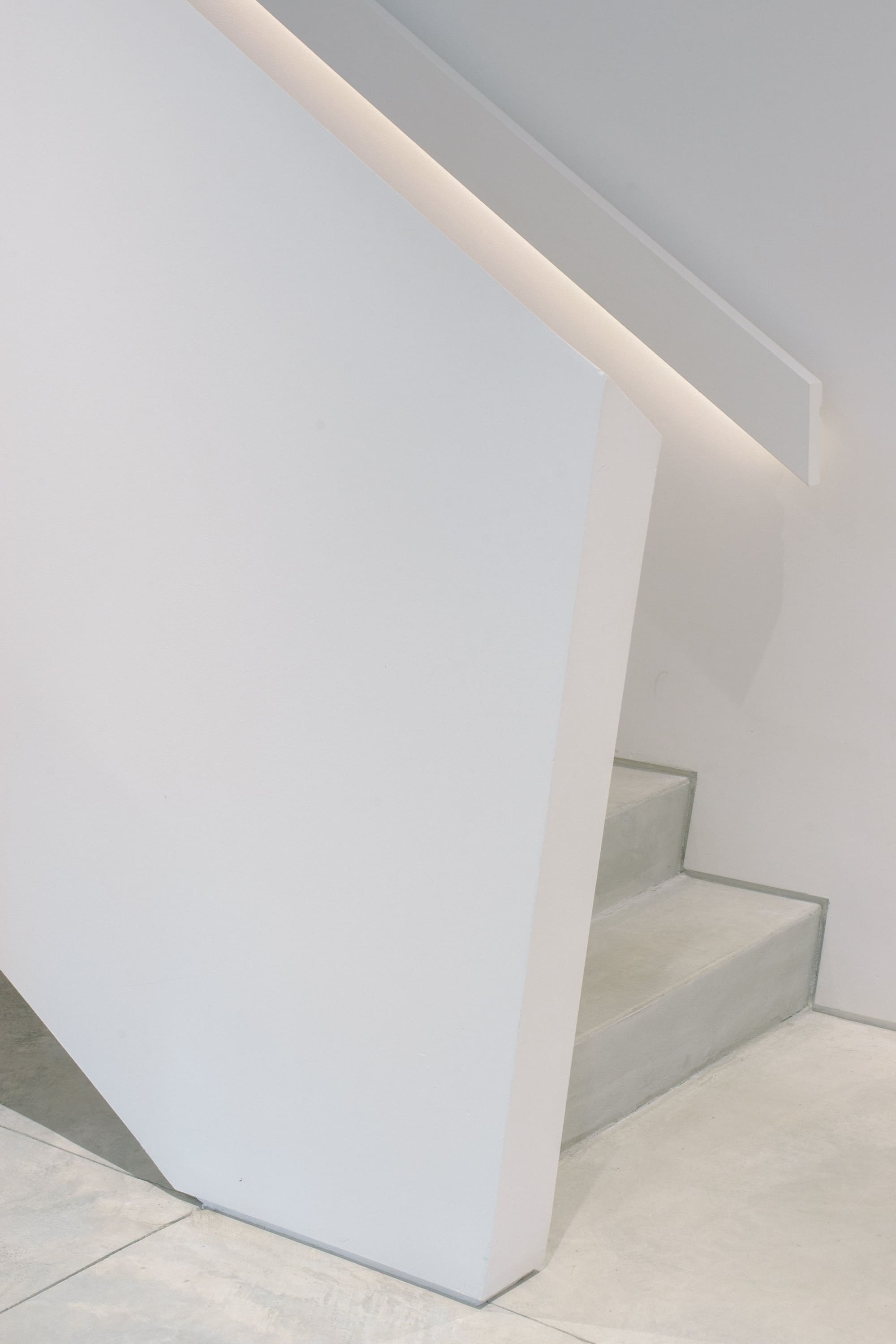 Bayridge — White stair with concealed linear lighting