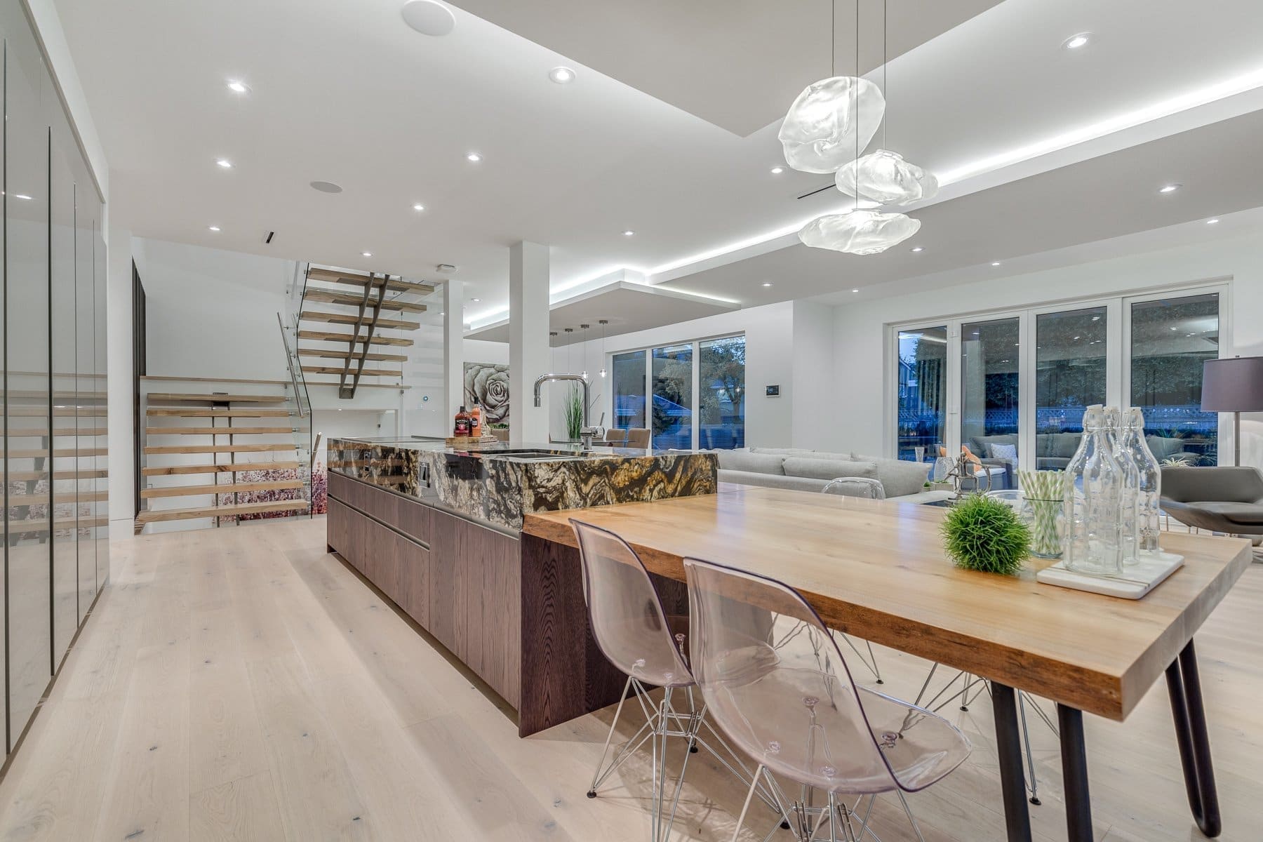 Wavertree — Kitchen island and dining space at dusk